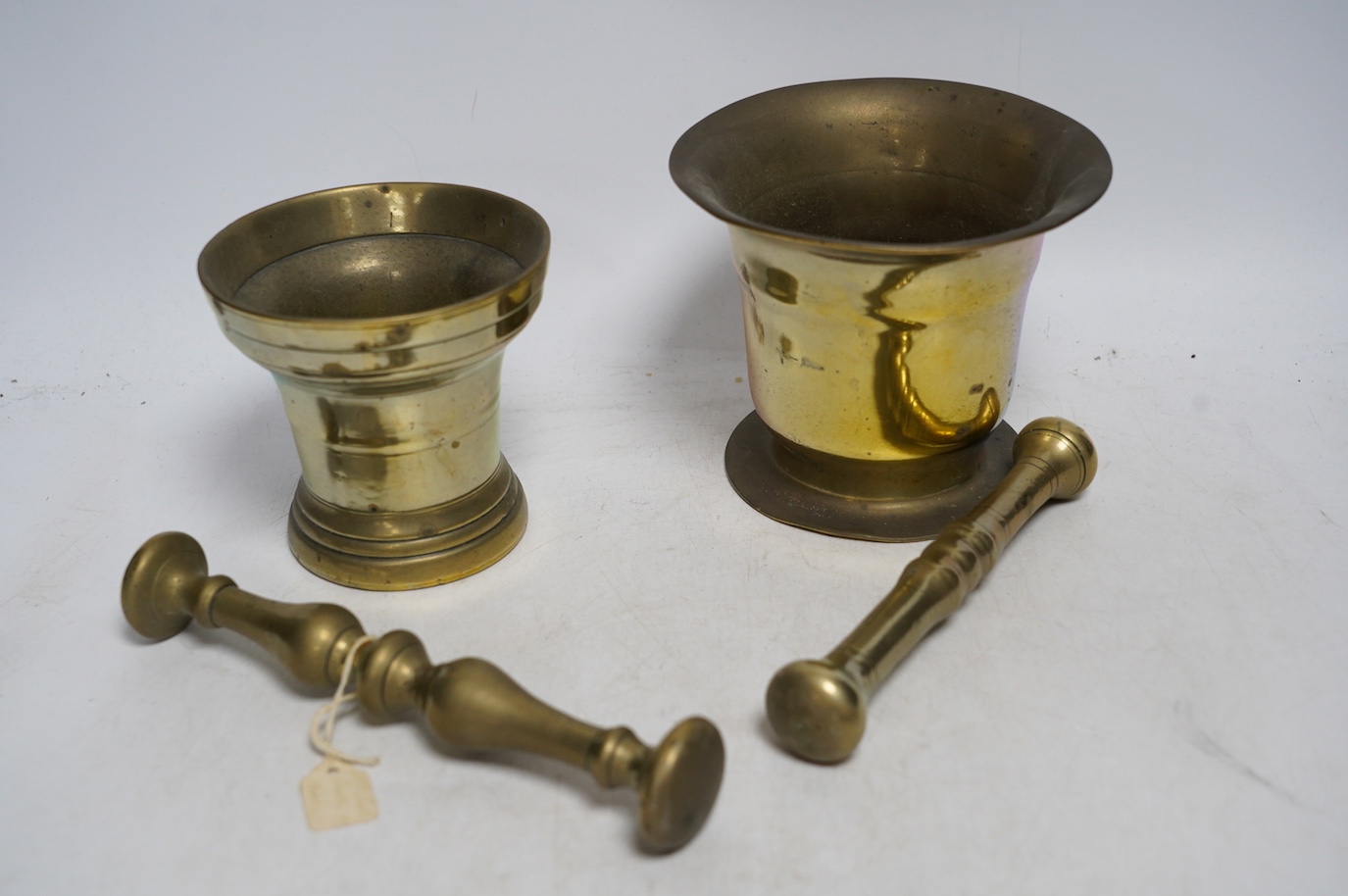 Two 19th century brass pestles and mortars. Condition - fair to good